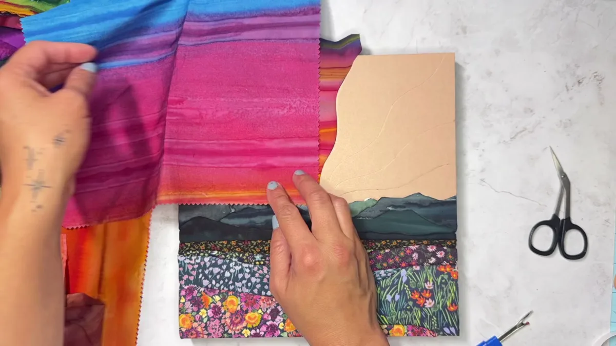 Bonus 2: timelapse frame of Hannah tucking the alternate colorway's striated batik sky